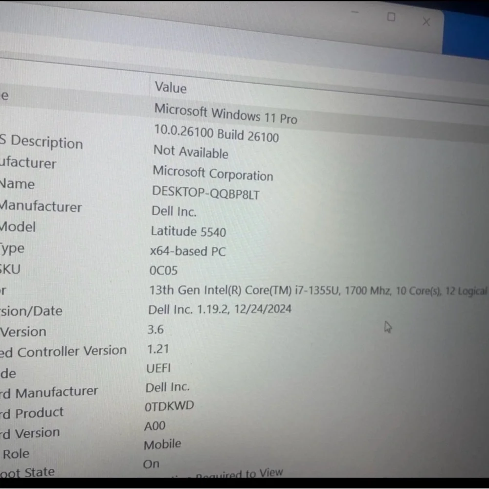 Dell Gray Laptop with Blue Display